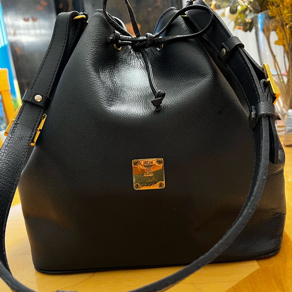 MCM Black Leather Shoulder Bag with Gold Accents comes w international MCM card